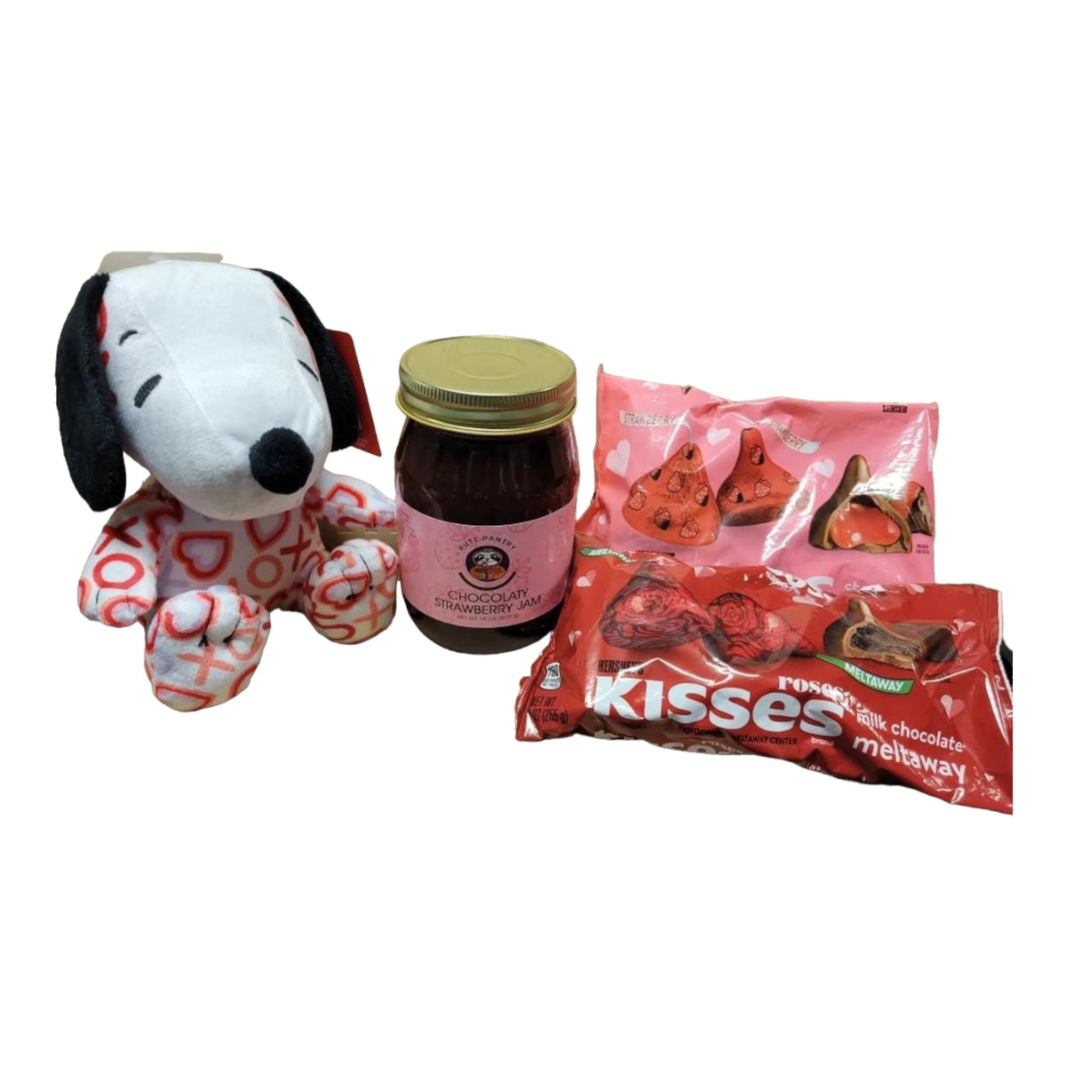 1 heart Snoopy plush, 1 9 oz bag of Hersheys chocolate dipped strawberry kisses, 1 9 oz bag of Hersheys milk chocolate meltway kisses, 1 18 oz jar F36825